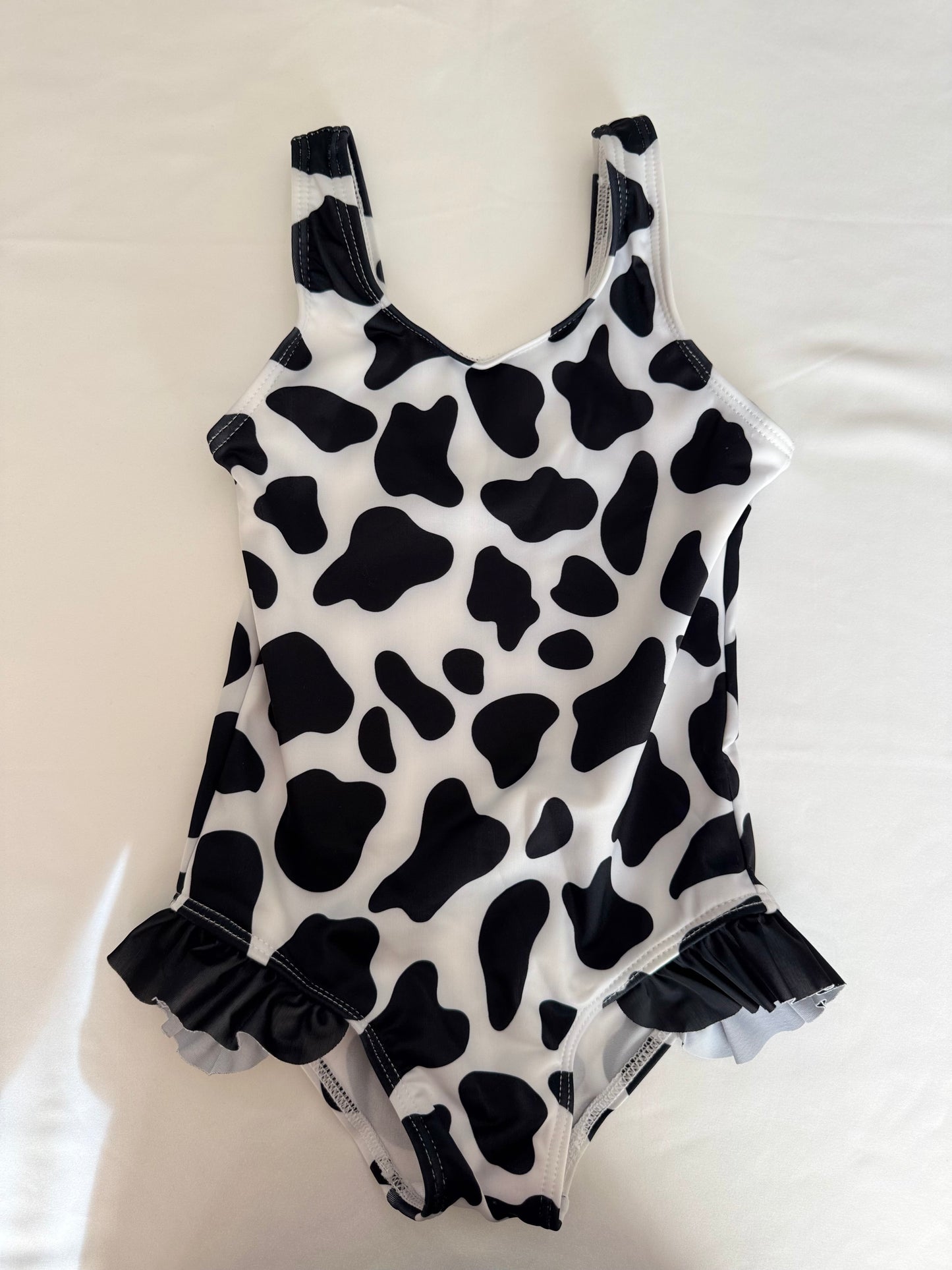 Ruffle farms cow one piece